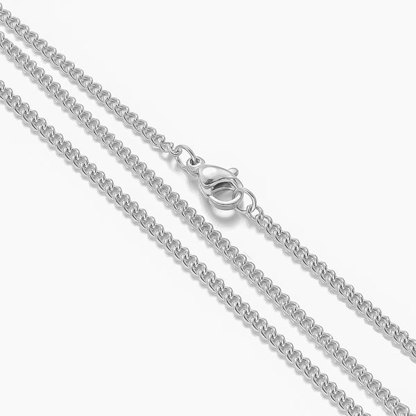 Close up image of a 2mm silver curb chain necklace
