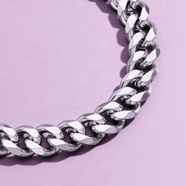 Close up image of a 3mm silver curb chain necklace