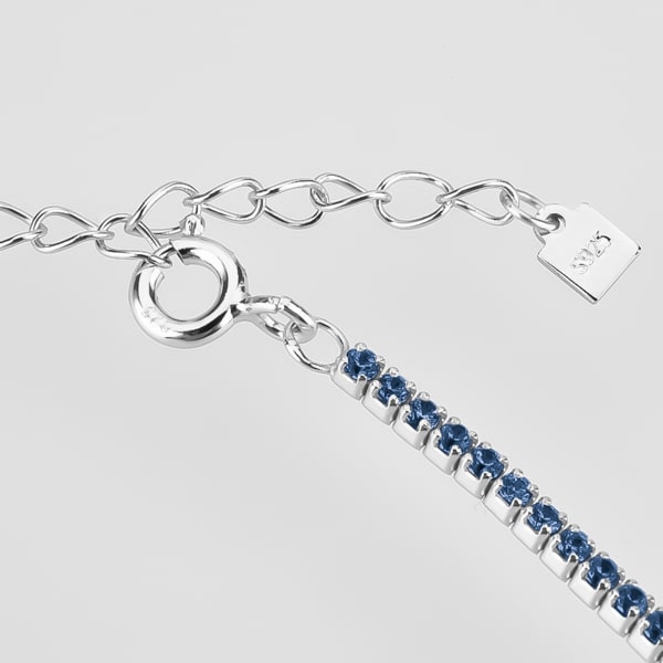 Details of the silver tennis choker necklace with blue cubic zirconia stones