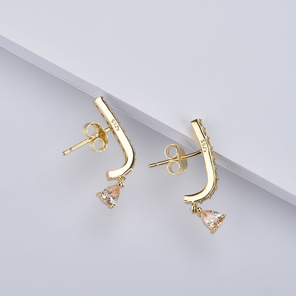 Gold curved bar earrings with champagne teardrop charm