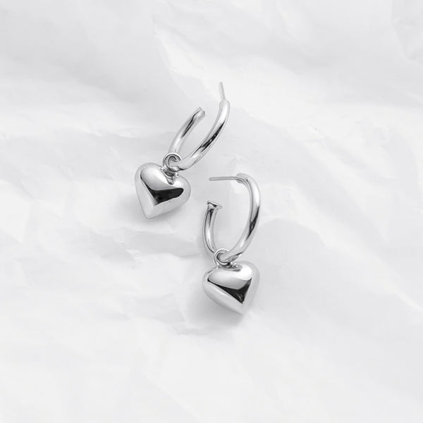 Chunky silver dangle heart hoop earrings details