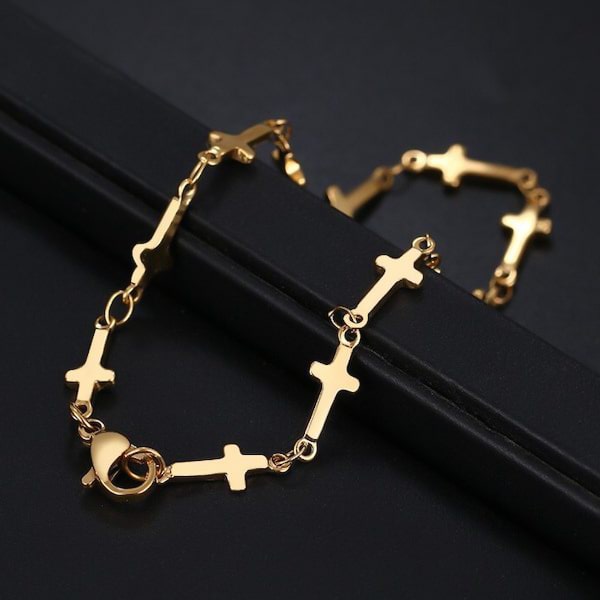 Cross chain bracelet made of gold-toned stainless steel