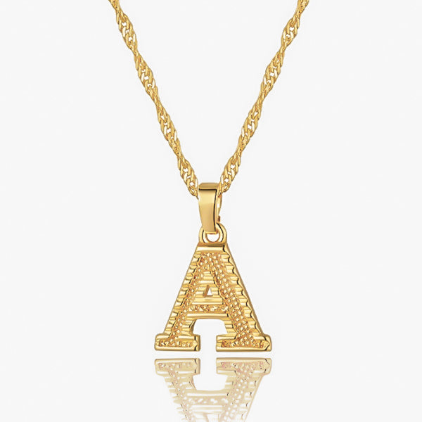 Gold initial letter pendant necklace closeup image
