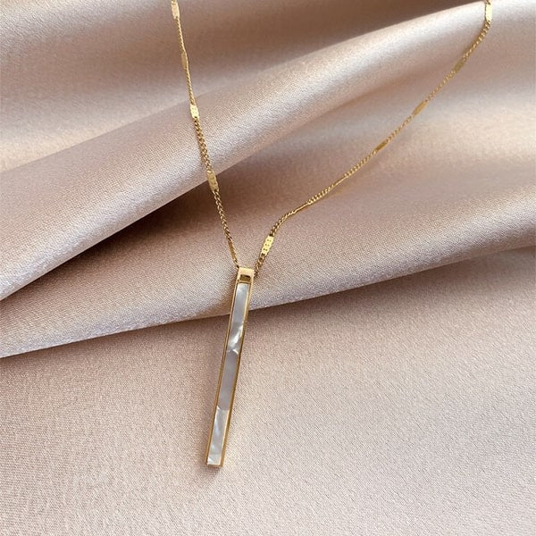 Gold bar pendant necklace with pearly inlay