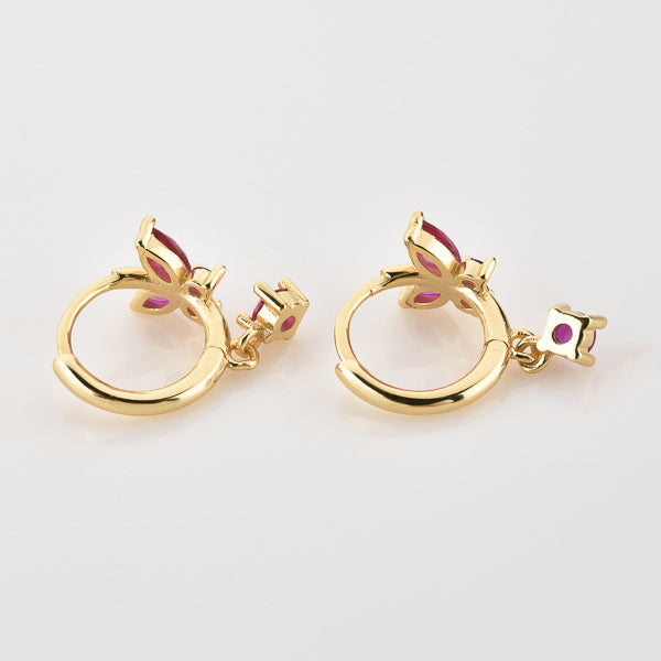 Gold and pink crystal butterfly huggie hoop earrings details
