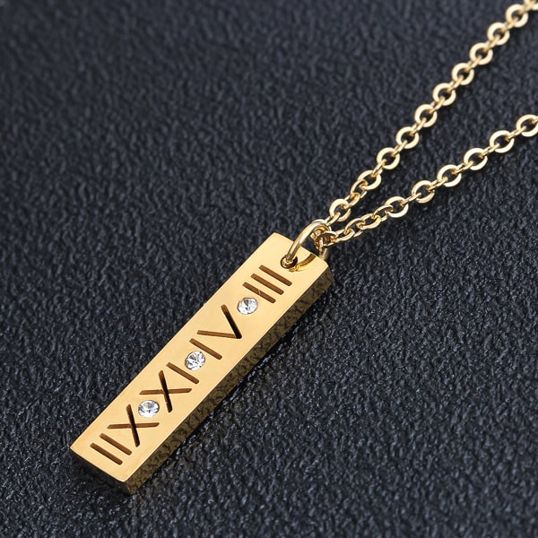 Gold Roman bar of wisdom necklace display