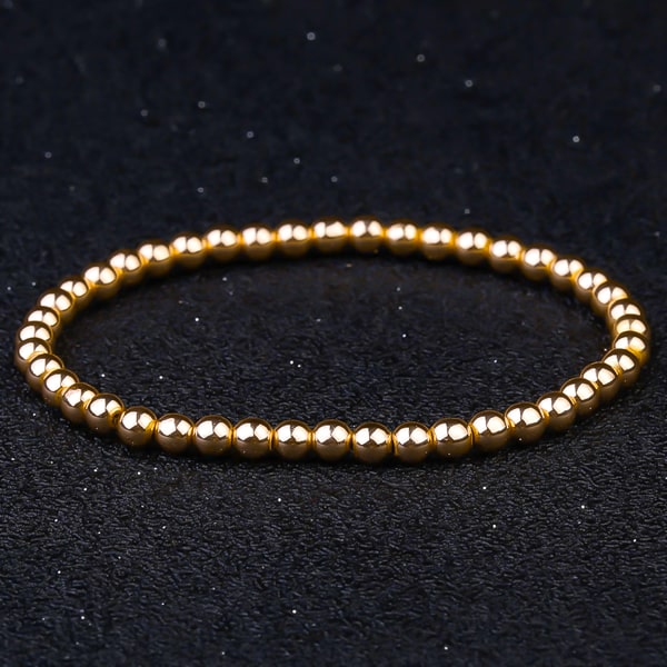 Gold beaded bracelet 4mm detailed close up