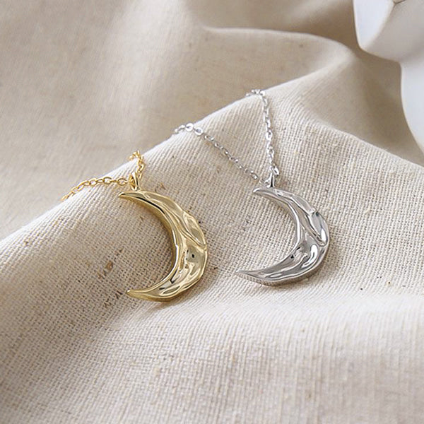 Gold crescent moon necklace details