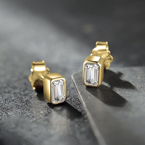 Gold emerald-cut crystal stud earrings details