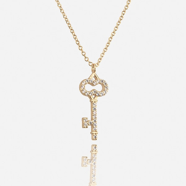 Gold key necklace details