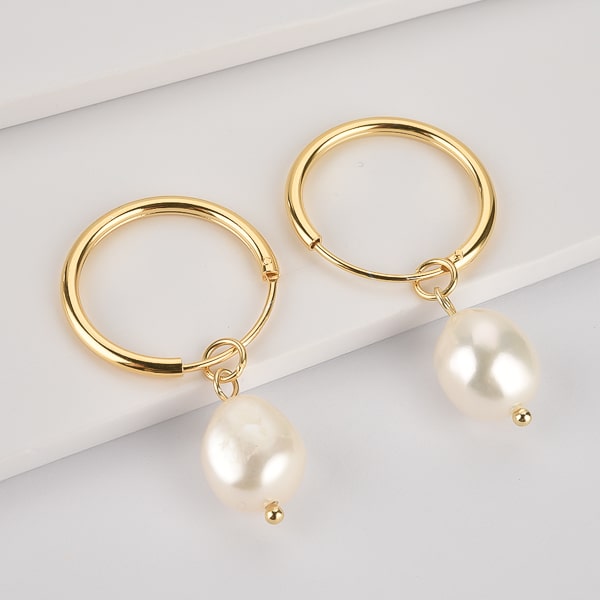 Gold large pearl drop hoop earrings details