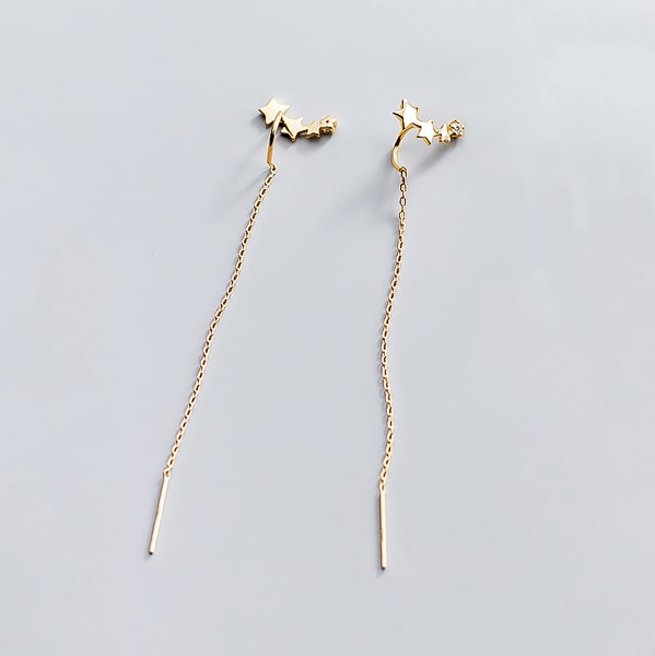Gold shooting star threader earrings detail