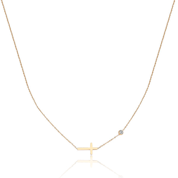 Gold sideways cross necklace