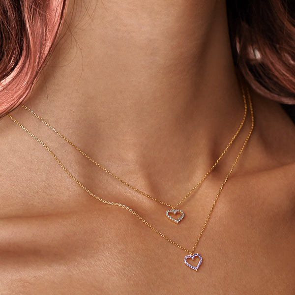 Violet crystal open heart on a gold necklace details
