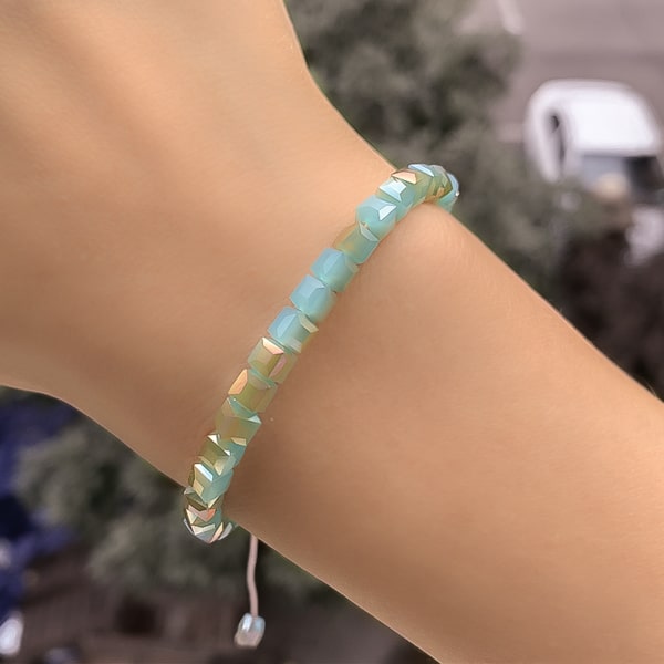 Ice blue square crystal bracelet on a woman's wrist