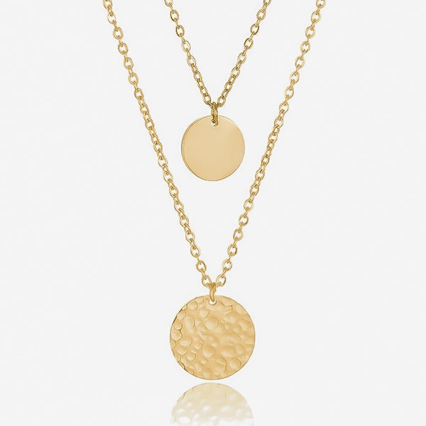 Smooth and hammered gold coin pendants on dainty layered chains