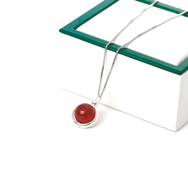 Red agate pendant necklace closeup image