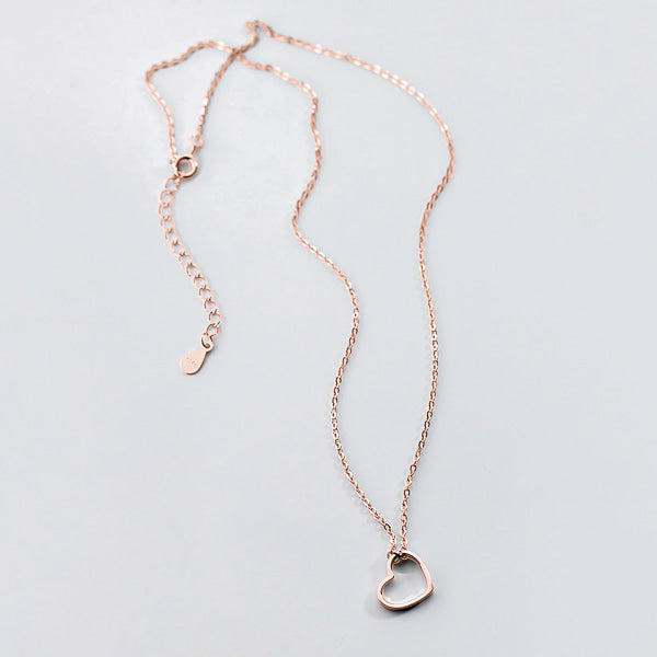 Rose gold open heart choker necklace display