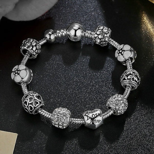 Silver charm bracelet with snake chain