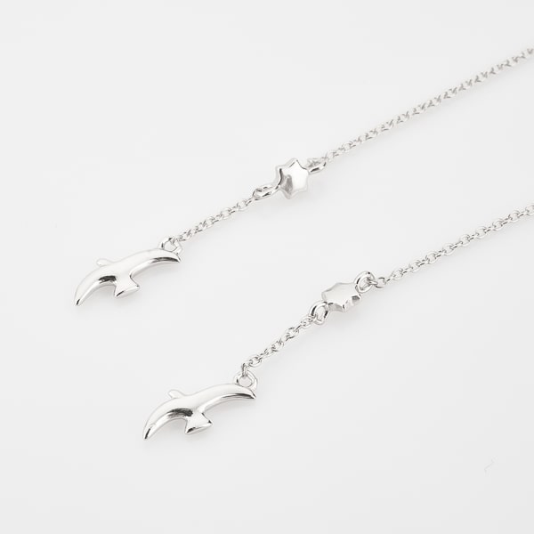 Silver bird threader earrings detail