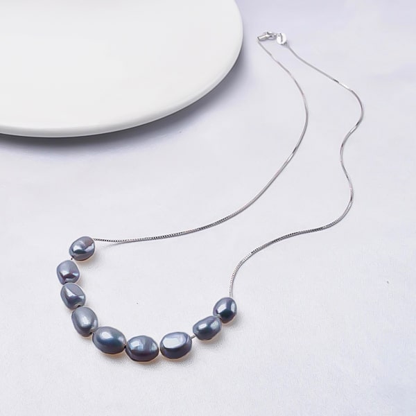 6-7mm black baroque freshwater pearls on a silver necklace