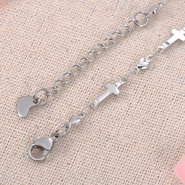 Silver cross chain ankle bracelet close up details