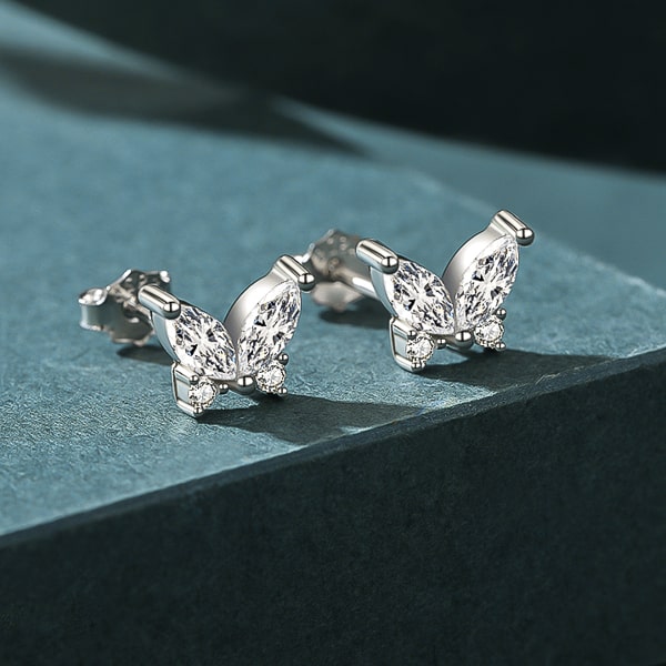 Silver crystal butterfly stud earrings detail