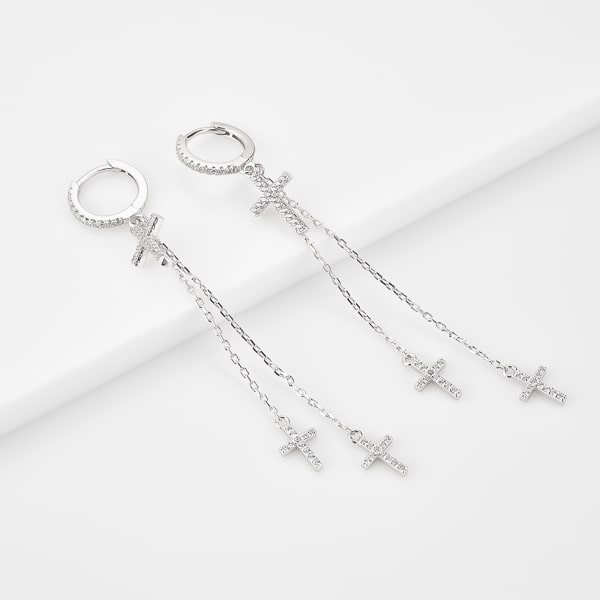 Silver crystal cross drop chain hoop earrings detail