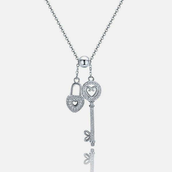Details of the silver key and lock heart necklace with crystal trim