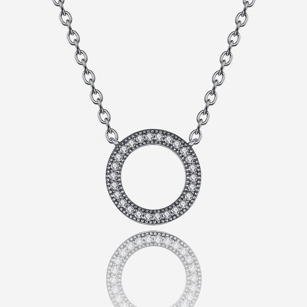 Round crystal ring on a silver necklace details