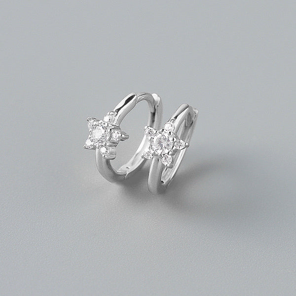 Silver crystal star huggie hoop earrings details