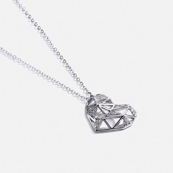 Silver geometric heart pendant necklace display