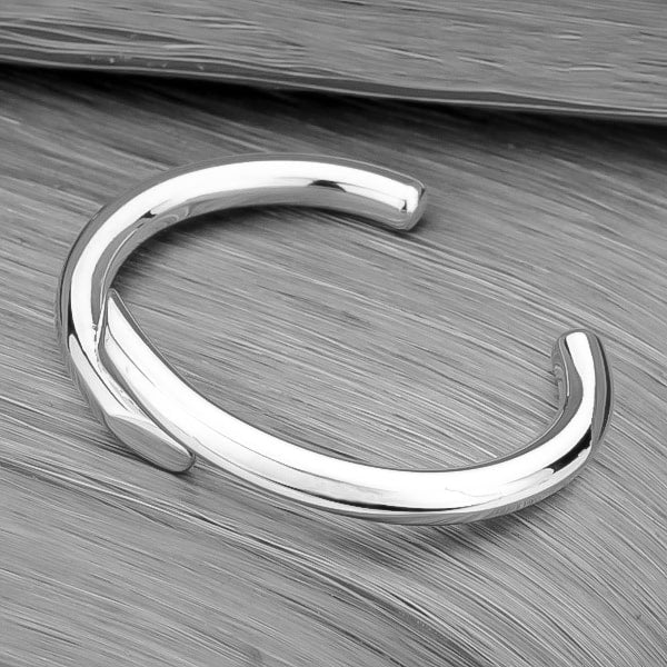 Silver harmony cuff bracelet viewed from its side