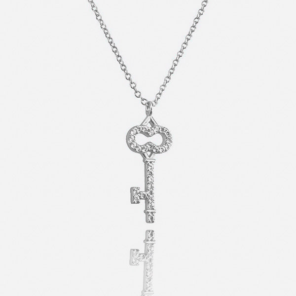 Silver key necklace details