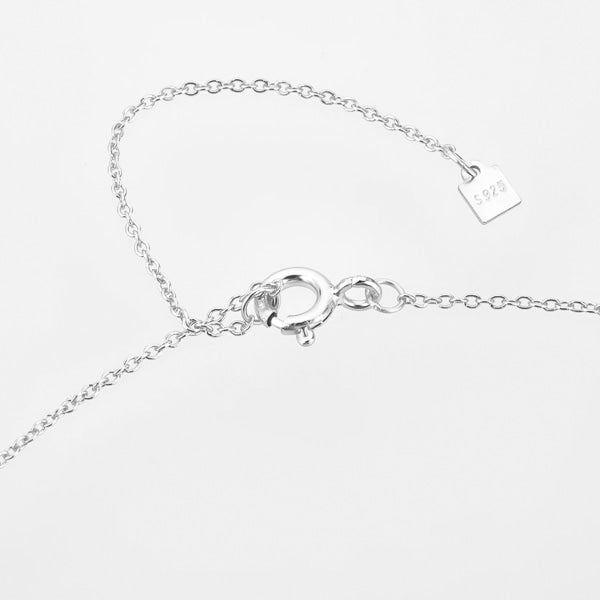 Silver mini lotus necklace lock display
