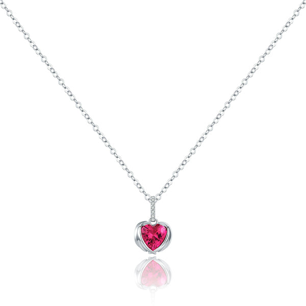 Fuchsia pink crystal heart pendant with protective wings on a silver necklace