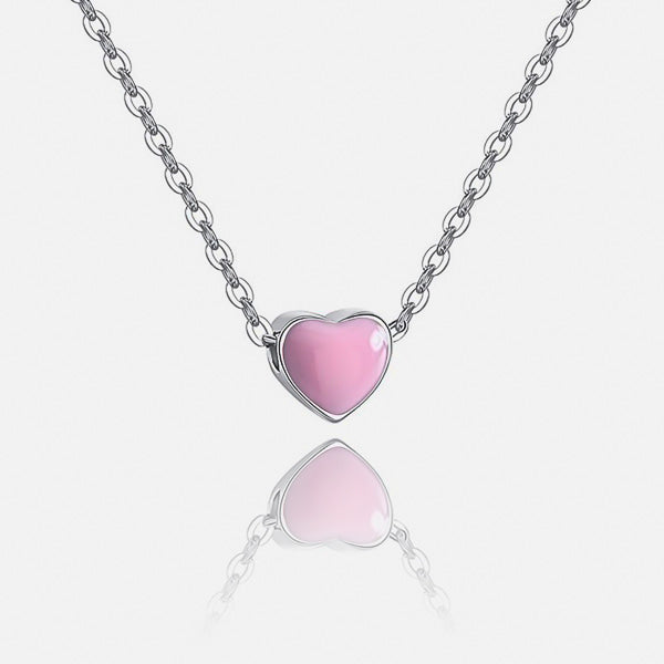 Small pink heart on a silver necklace details