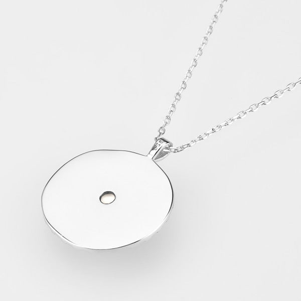 Silver sunrise coin necklace backside details