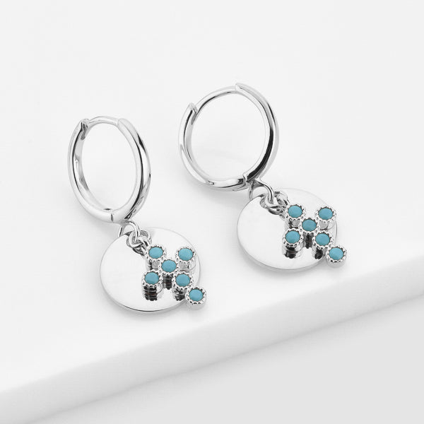 Silver and turquoise cross charm hoop earrings details