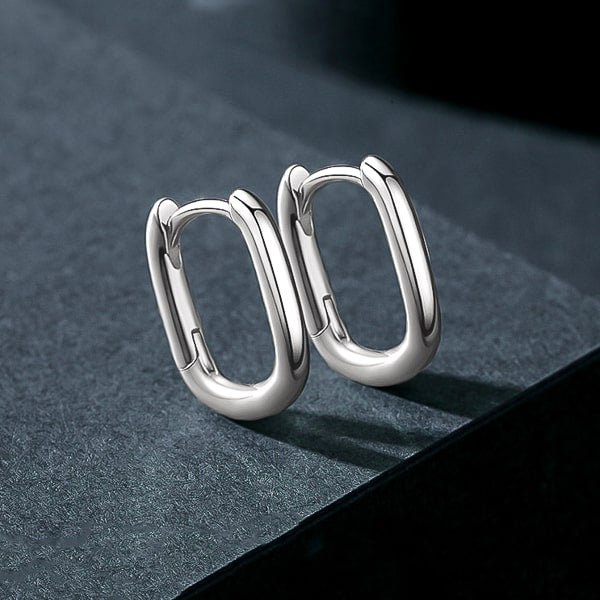 Small silver oval hoop earrings details