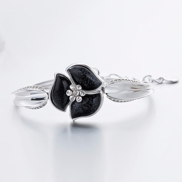Sterling silver flower bangle bracelet detailed view