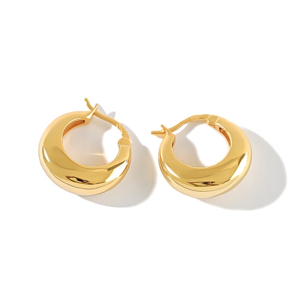 Thick gold teardrop huggie hoop earrings detail