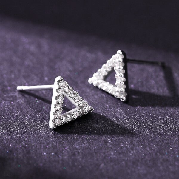 Triangle CZ pavé stud earrings close up