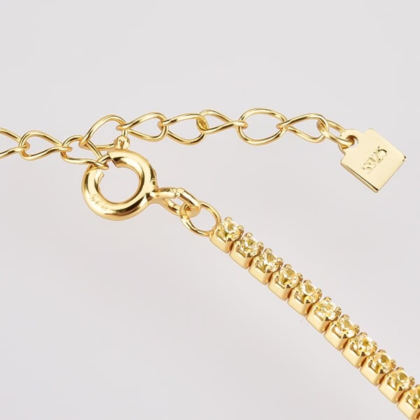 Details of the gold tennis choker necklace with yellow cubic zirconia stones