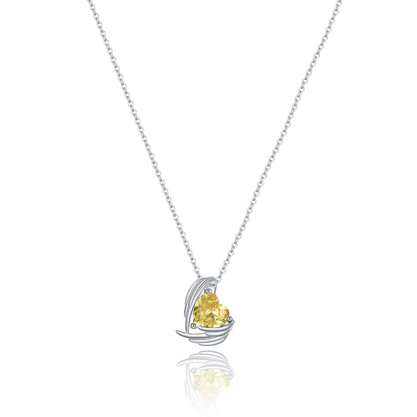 Yellow crystal heart and angel wings pendant on a silver chain