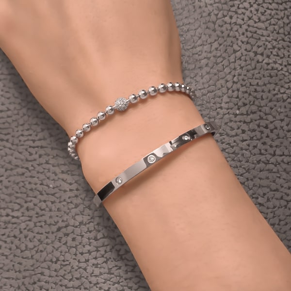 thumbnail interactive-video image 1 of Women's 6.5" Stainless Steel 4mm Cuff Bangle Bracelet – High Polish With CZ 1 of 4