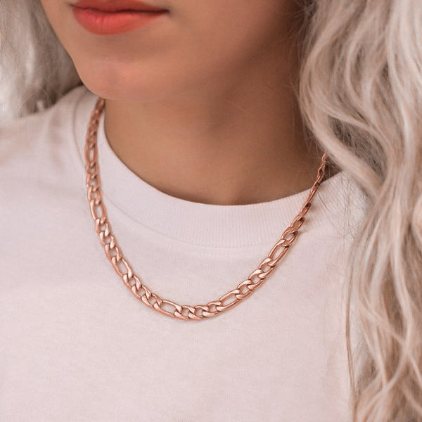 Woman wearing a 6mm rose gold figaro chain necklace