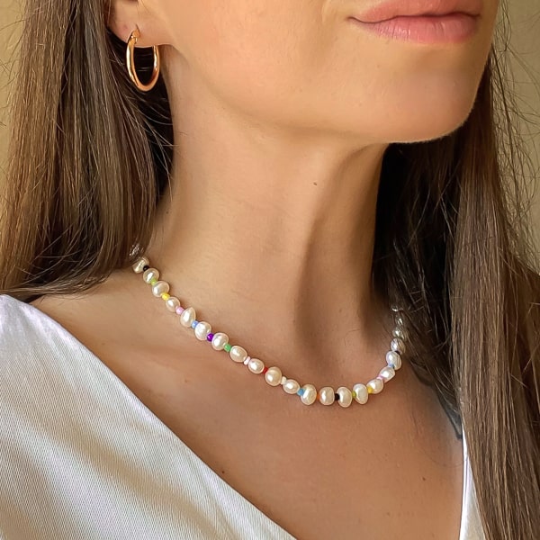 7-8mm rainbow freshwater pearl necklace on woman's neck