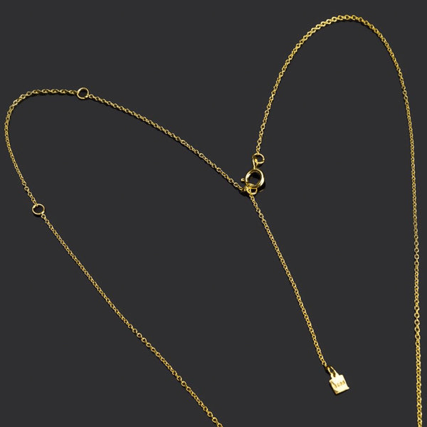 Adjustable gold vermeil chain on an initial letter necklace