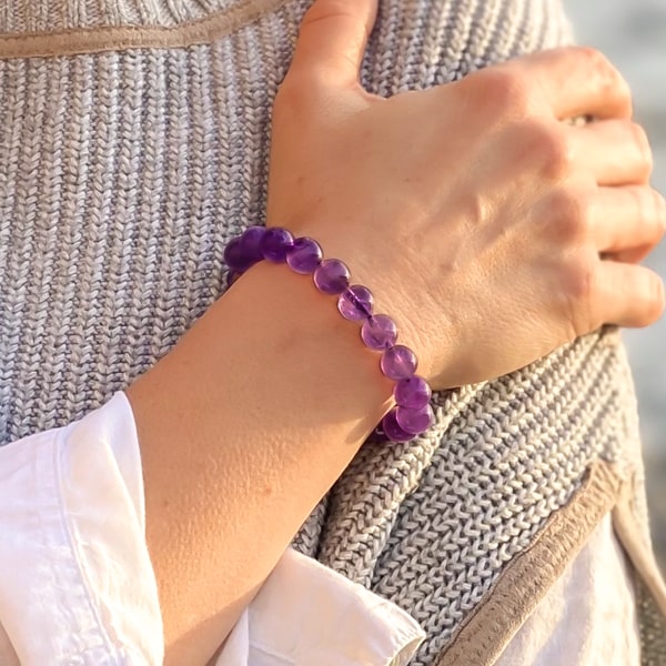 Beaded amethyst bracelet on a woman's wrist